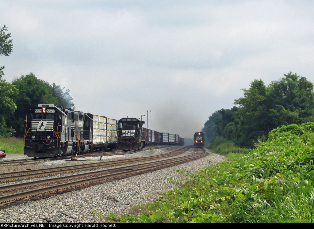 NS 5529 on train P92 waits for train 213 to pass before leaving the old yard